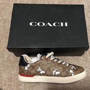 Brand New. Coach X Peanuts Clip Low Top Sneaker With Snoopy Print.